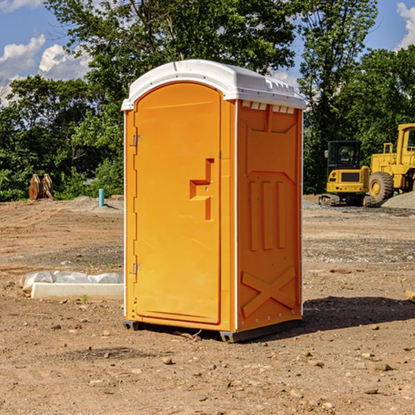 what is the cost difference between standard and deluxe portable restroom rentals in Rock Mills Alabama